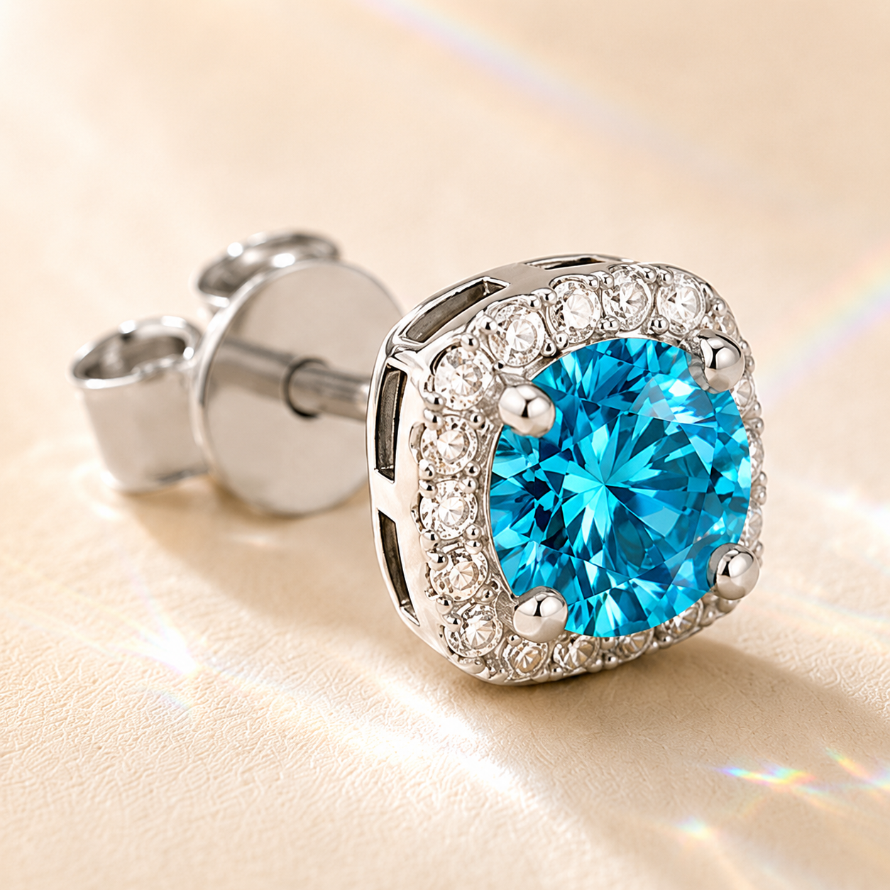 Ocean Blue Halo 1 Carat Each Cushion Colored Moissanite Stud Earrings — close-up setting detail