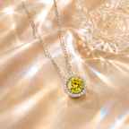 Yellow Aura 2 Carat Round Halo Colored Moissanite Necklace — styled still-life view