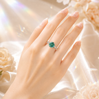 Green Clarté 2 Carat Six-Prong Colored Moissanite Ring — worn styling view
