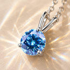 Sky Blue Solis 1 Carat Three-Prong Colored Moissanite Necklace — close-up setting detail