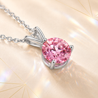 Pink Solis 1 Carat Three-Prong Colored Moissanite Necklace — close-up setting detail