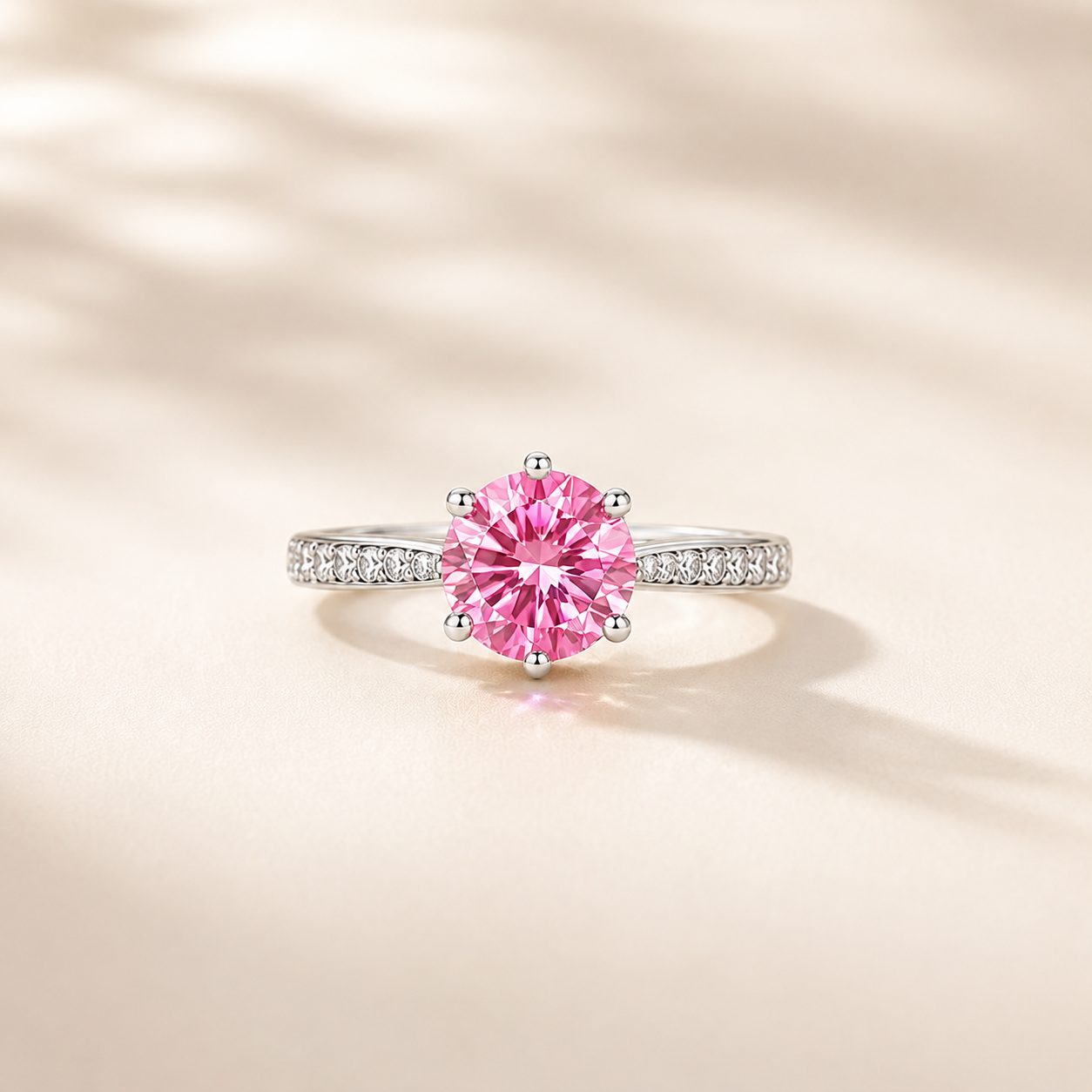 Pink six-prong colored moissanite ring
